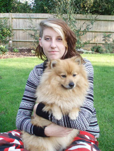 Bekki Dog Groomer and her dog knuckles in the garden